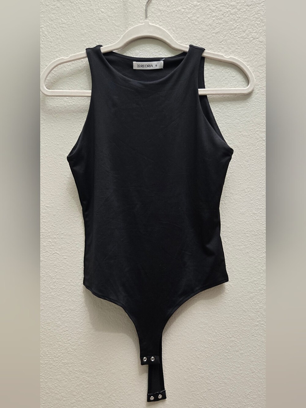 ReoRia Black One-Piece Bodysuit with Snap Closure